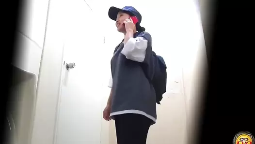 EE-742 03 Hidden camera: Thrilling defecation of women dressed as men in the men’s restroom