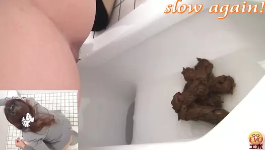 EE-022 02 Peeping on how feces piling up in the toilet bowl. WC vouyerism