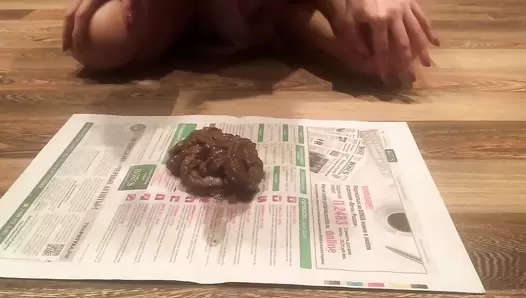 Lily - Shit on the newspaper