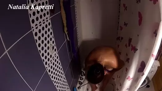 Shit-eater washing after eating fruit with shit