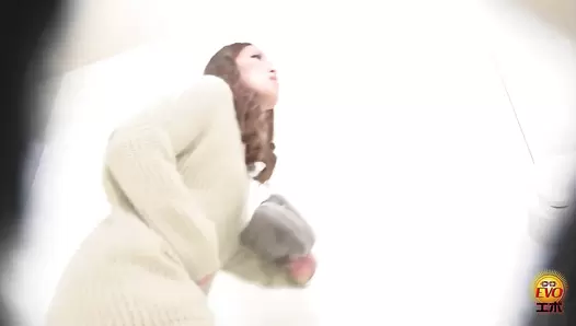 EE-556 05 Hidden camera: Japanese gals straddling a japanese style toilet and having diarrhea