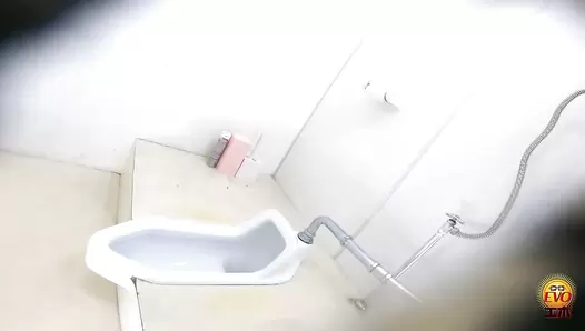 EE-556 01 Hidden camera: Japanese gals straddling a japanese style toilet and having diarrhea