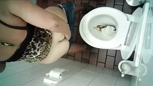 Hidden camera in the womens restroom and diarrhea woman