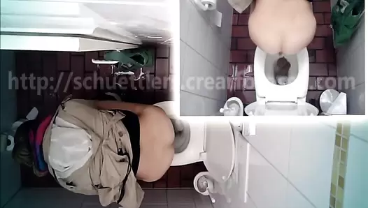 Hidden camera in the toilet and pooping woman