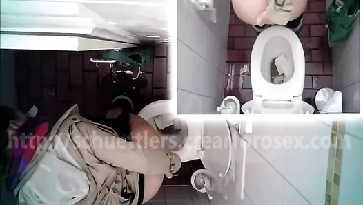 Hidden camera in the toilet and pooping woman