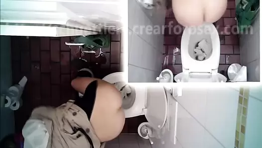 Hidden camera in the toilet and pooping woman