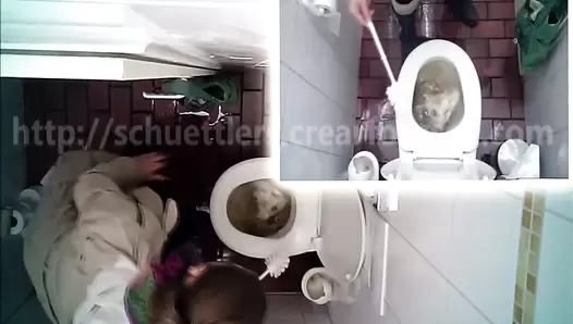 Hidden camera in the toilet and pooping woman