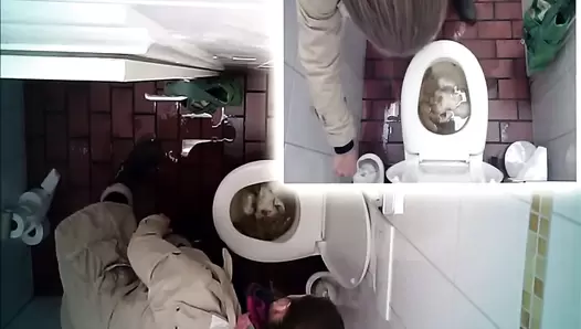 Hidden camera in the toilet and pooping woman