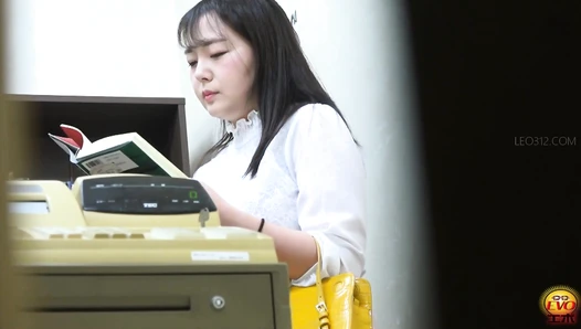 EE-799 07 Hidden camera footage of defecation in a bookstore: womens sudden urge to poop.