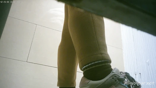 Sneak shot of women's restroom in shopping mall 18