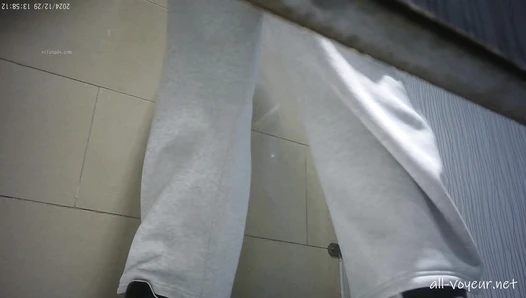 Sneak shot of women's restroom in shopping mall 22